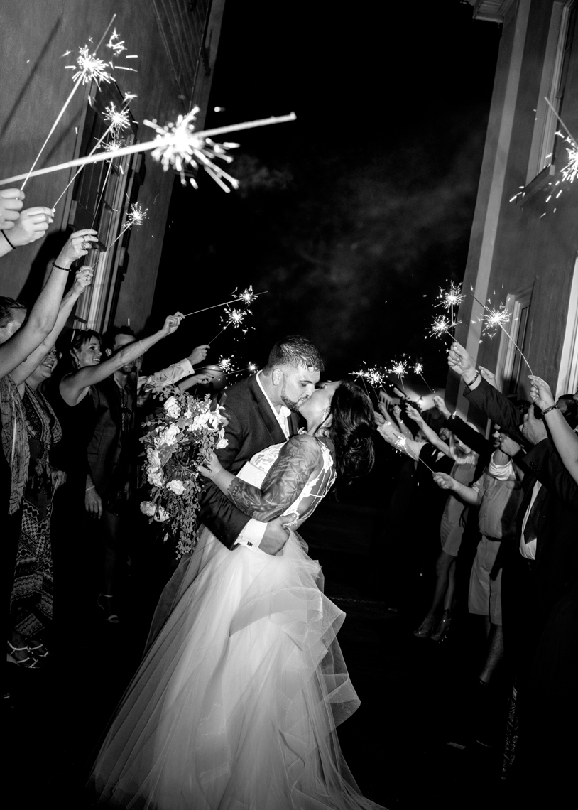 Great-Sparkler-Exit-Bride-and-groom-kissing-bw
